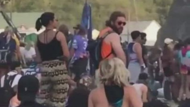 Amateur. Public facesitting in a concert. There are a lot of people around - gif