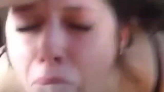 Pigtailed teen gets facial from huge cock