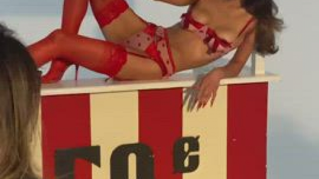 Leaving lipstick mark on Friends boob during photoshoot