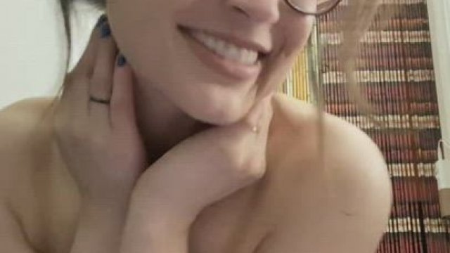 Showing off her new glasses