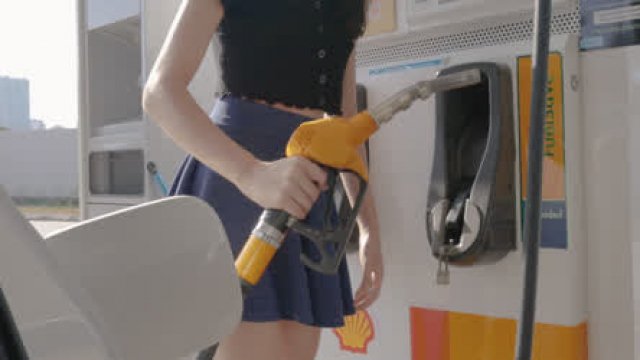 Some risky flashes to pass the time while pumping gas