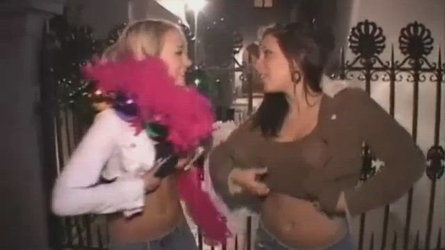 Mardi gras girls meeting each other.