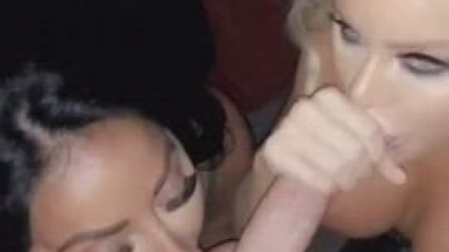 2 girls share a cock in the parking lot